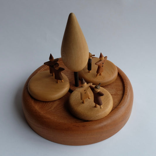 UNDER THE SMALL TREE